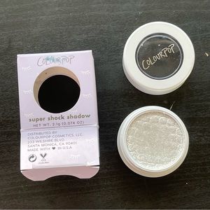 Colourpop Supershock Shadow in Tassel, a bright white silver shade.